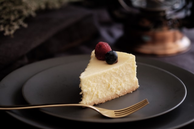A slice of cheesecake on a plate